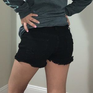 Black ripped jean shorts